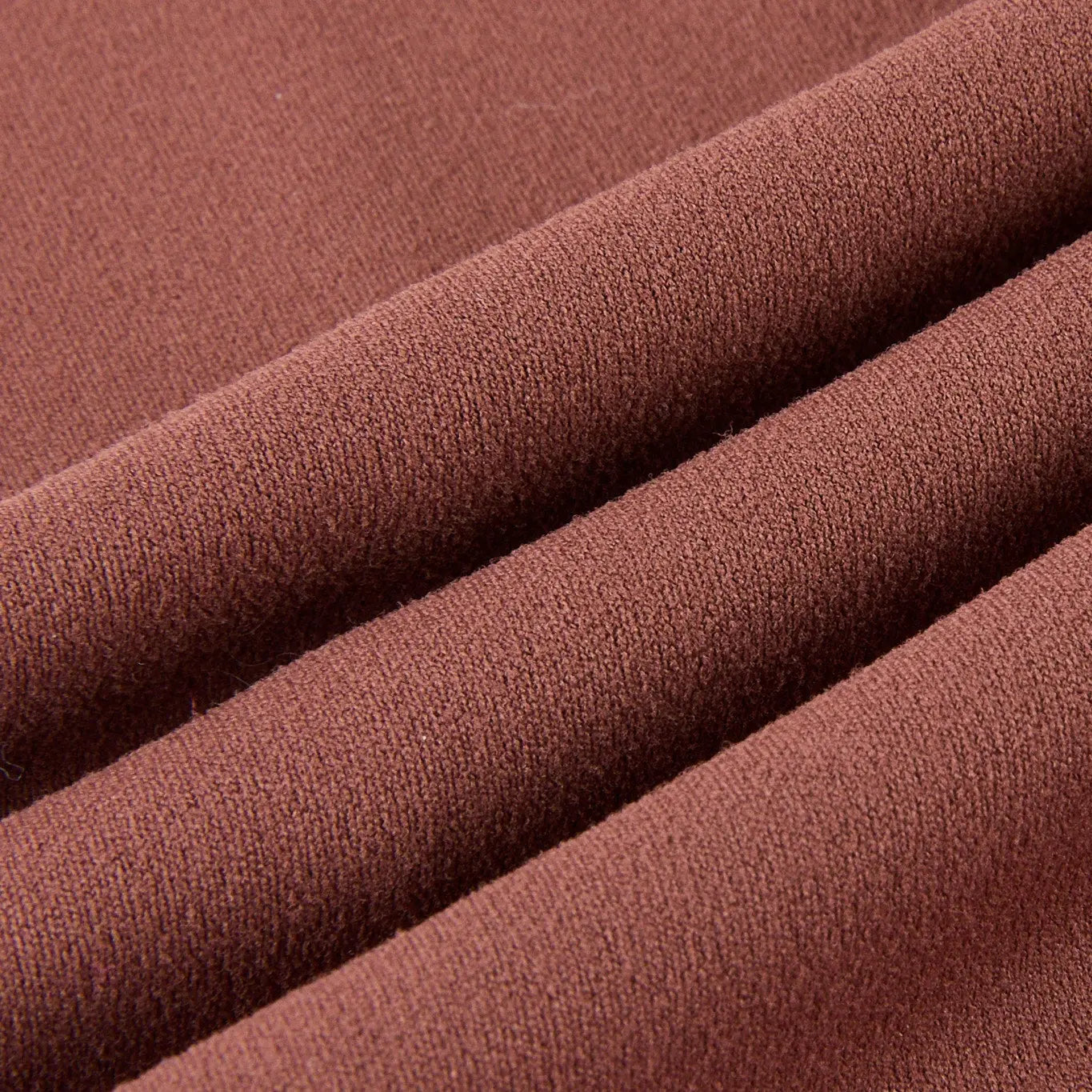 Close-up of brown fabric with a textured surface
