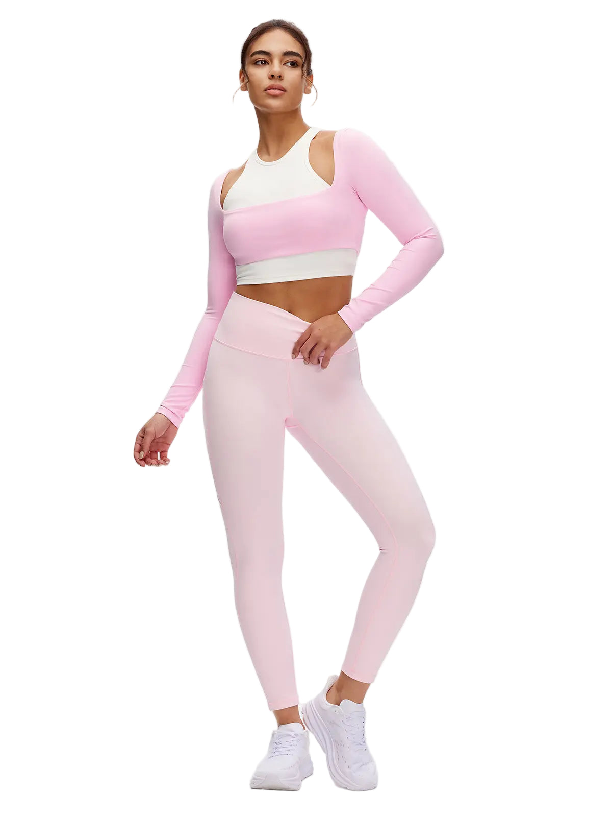 Person wearing a pink and white athletic outfit on a white background