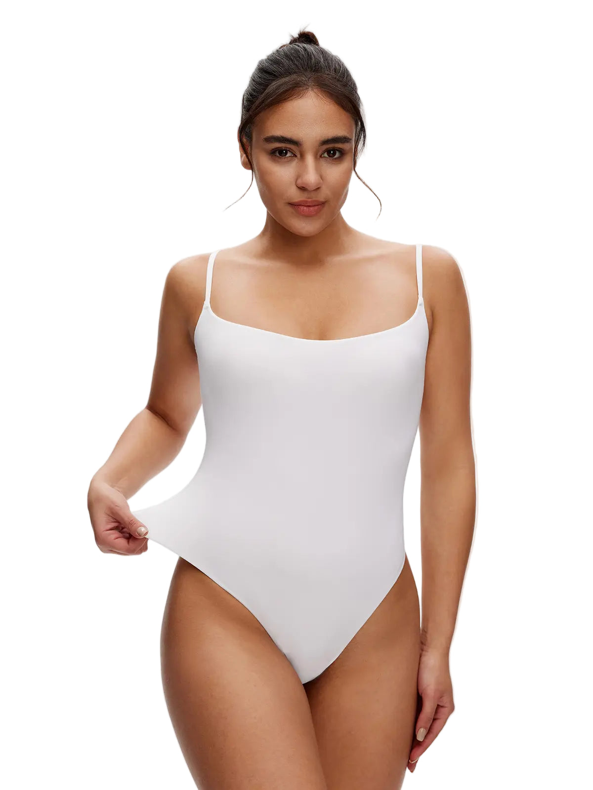 Woman wearing a white one-piece swimsuit on a plain background