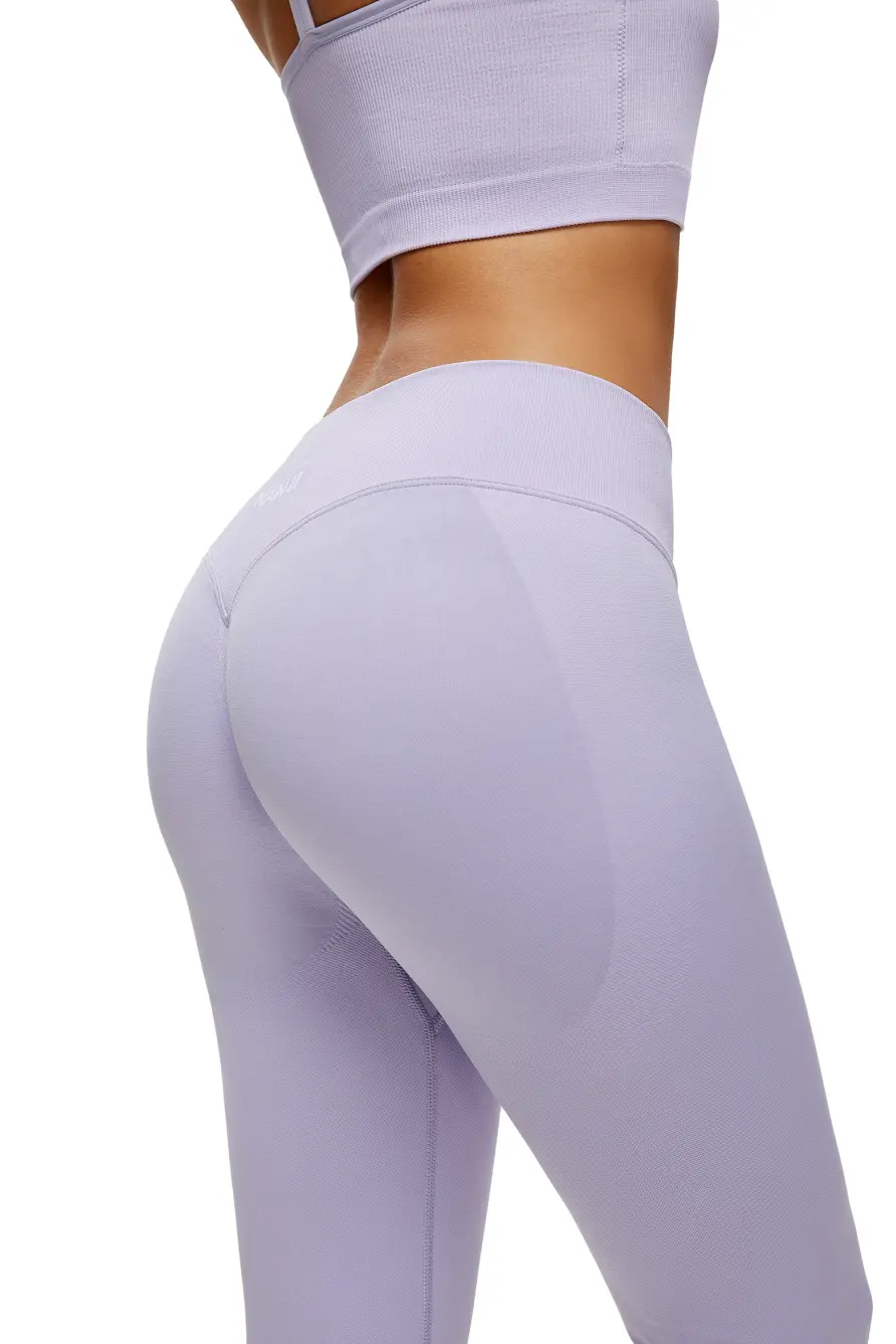 Lavender leggings worn by a person on a white background