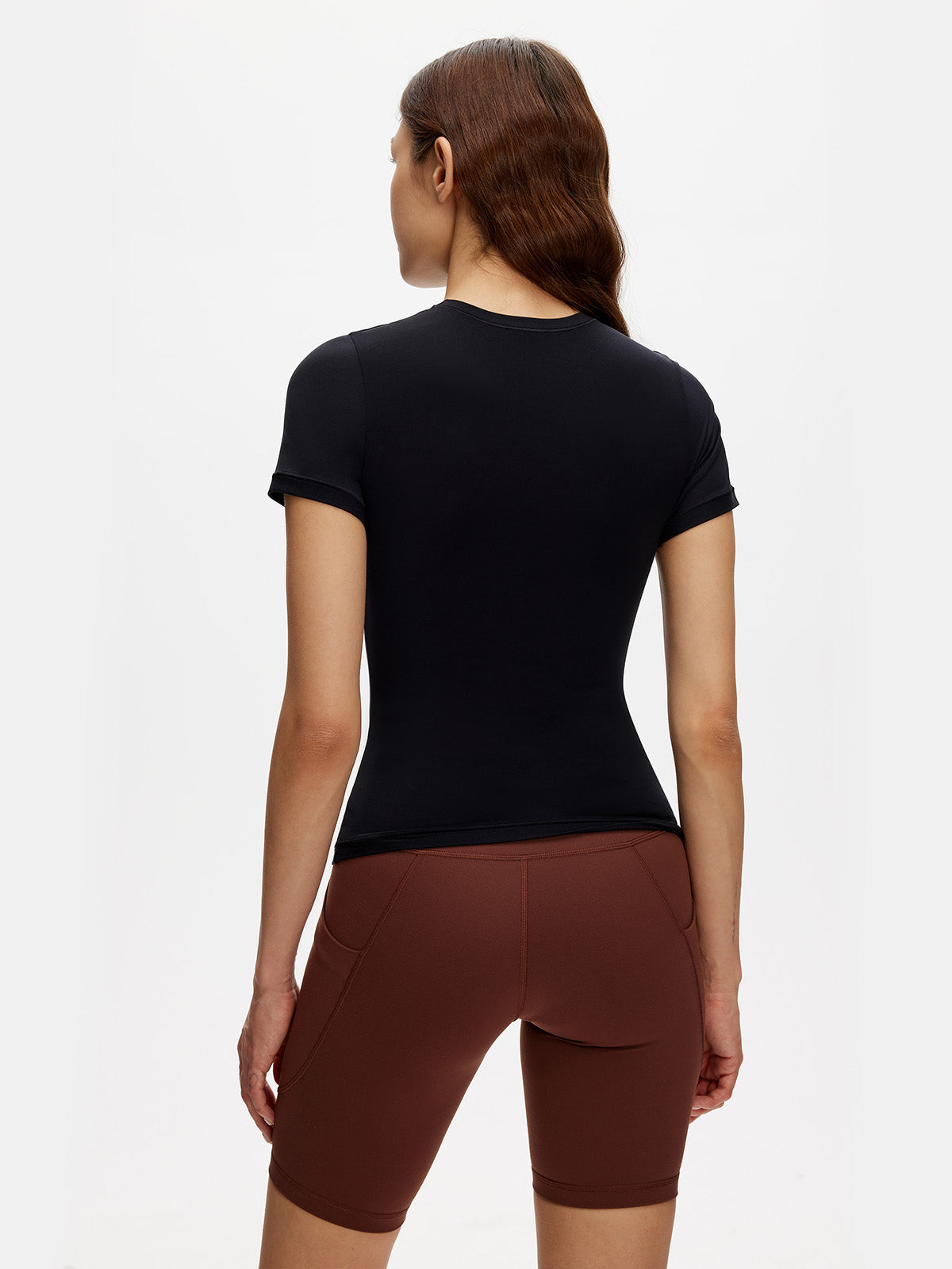 Back view of black short sleeve t shirt – slim fit, soft stretch fabric, minimalist style


